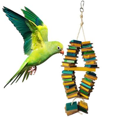 China Viable Parrot Toys For Medium Cardboard Bird Toys Gray Natural Wooden Bird Cage African Chewing Toy for sale