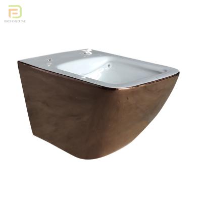 China Hidden Tank Wholesale Design Luxury Bathroom Rose Tankless Gold Water WC Ceramic One Piece Wall Hung Toilet for sale