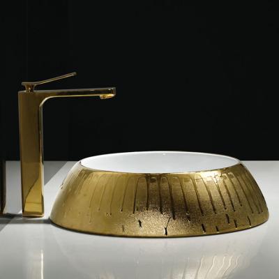 China New Product Modern Hand Sink Modern Irregular Lava Design Wash Bathroom Gold Ceramic Luxury Drip Basin For Hotel for sale