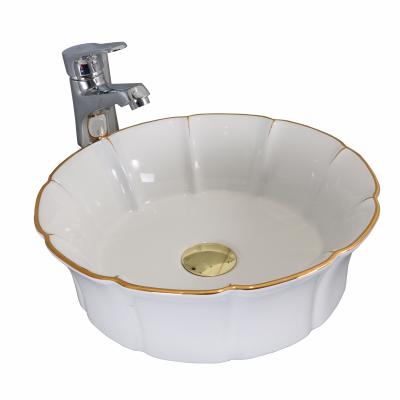 China Art Portable Modern Gold Line Flower Shape Ceramic Table Top Basin Wash for sale