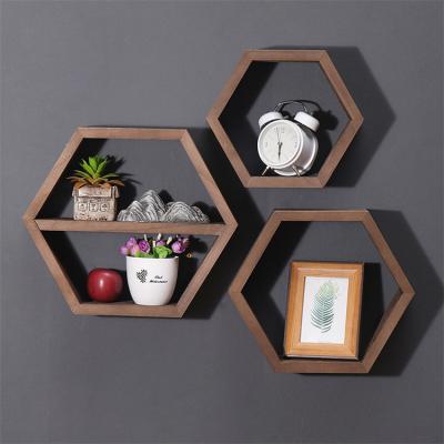 China Kitchen Storage Set Display 3 Decorative Geometric Hexagon Shape Wooden Wall Mounted Floating Shelves For Bedroom Living Room for sale