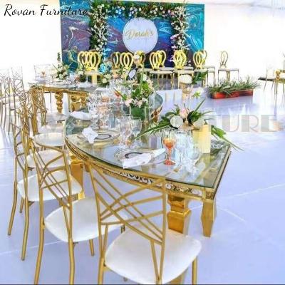 China New Style Stainless Steel Wedding Table Modern Glass Top Decor Gold Serpentine Dining Table For Wedding Used for sale