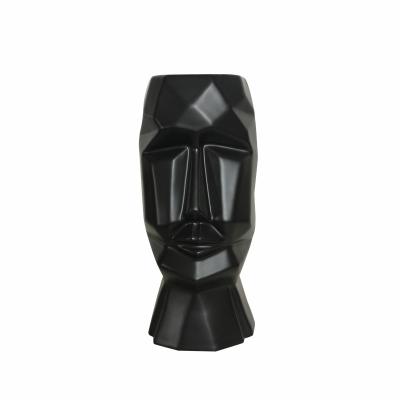 China Sustainable Homeware Wholesalers Ceramic Body Face Shaped Vases Matte Black Color Porcelain for sale