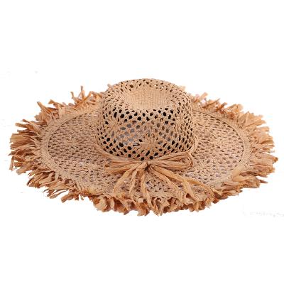 China New Design Dobby 2020 Summer Handmade Natural Floppy Straw Hat Beach Cool Hollow Straw Hat For Woman for sale