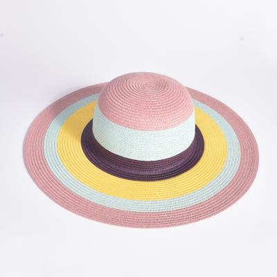 China 2021 New Summer Outdoor Beach Character Design Pink Multicolor Stitched Paper Braid Hat Travel Soft Straw Hats for sale