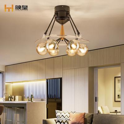 China Smart Control 48 Inch New Modern Clear Glass Fan Blade Design Remote Molecule And Retractable Ceiling Light for sale