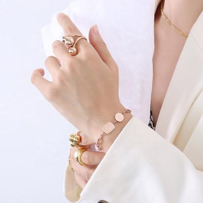 China FASHIONABLE 18K Gold Plated Artificial Couples Titanium Steel Dangling Chain Bracelet Charm Coin Boy Bracelet for sale