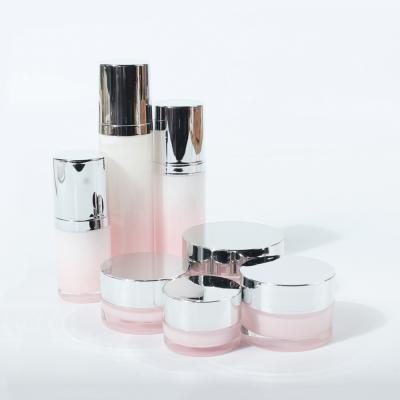 China Round Gradient Pink Cosmetic Cylinder Acrylic Airless 15/30/50ml Pump Bottle And Cream Jars Set 10/15/30/50g for sale