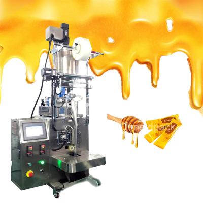 China Pneumatic Pouch Food Vertical Filling Mustard Frying Oil Cream Pickle Packing Machine for sale