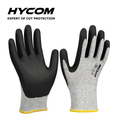 China Cut resistant glove sandy nitrile coated hppe cut resistant work safety gloves for industrial work used for sale