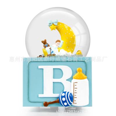 China Custom Christmas Snow Globes Luxury Resin Moon Baby Music Box Ornament Snowball Souvenirs Ornament Christmas Snow Globe for sale