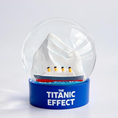 China Luxury Custom Snowball Titanic 100mm Snow Globe Europe Romantic Collectable Ornament Souvenir Snow Globes for sale