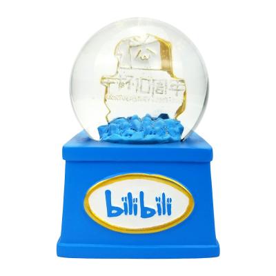 China Custom Europe 45mm Acrylic Resin Gift Snow Globes Souvenirs Throw Snowballs Ornament Luxury Snowball Snow Globe for sale