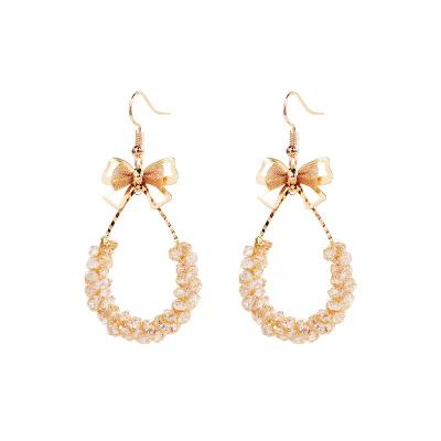 China FASHIONABLE high end custom pearl earrings. Butterfly Cavity Luxury Crystal Earrings for sale