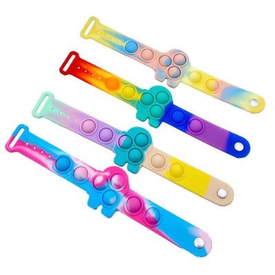 China HUAYI silicone trigger noise bracelet stirrer toy jumps bracelet stirrer toy finger stirrer toy bracelet noises stir toy bracelet for sale