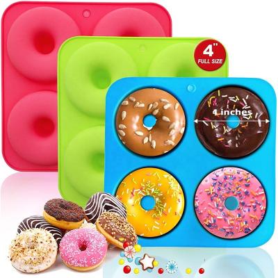 China Amazon viable hot selling bakeware set 4 cavity tray silicone cake pan silicone mold donut baking pan for sale