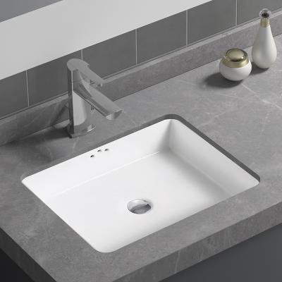 China Three Ceramic Overflow Holes Under Counter Hand Wash Sinks Cabinet Wash Basins for sale