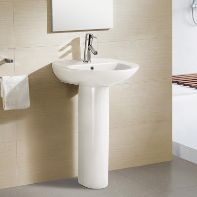 China Easy Clean Modern Bathroom Sanitary Ware Designers White Ceramic Pedestal Sinks for sale