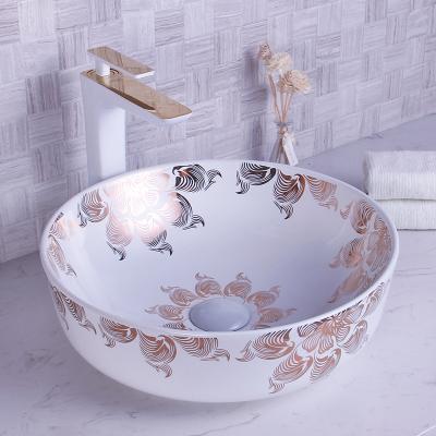 China Modern Design Luxury Bathroom Gold Flower Ceramic Dark Color Art Basin for sale