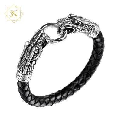 China Black punk titanium steel wholesale creative geniue bracelet bibcock trend rock jewelry leather bracelet for sale