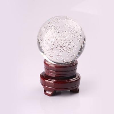 China Europe Crystal Ball 60mm Centerpiece Crystal Ball With Bubbles For Desk Table Decoration for sale