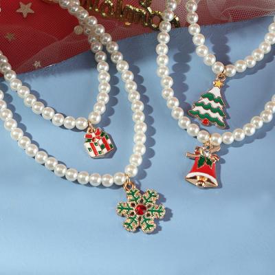 China TRENDY Pearl Christmas Necklace Alloy Dripping Snowflake Bell Christmas Tree Necklace Christmas Necklace Jewelry Gift for sale