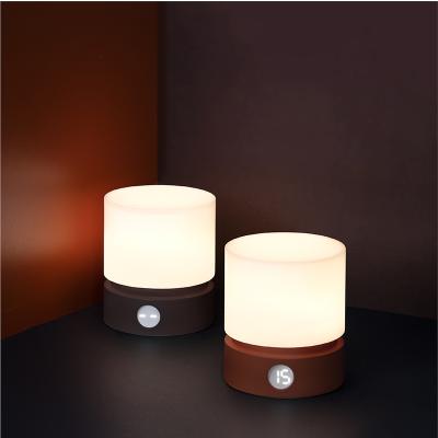 China Modern Nordic Cylindrical Night Light Bedside Lamp Bedroom Stepless Dimming Synchronization Rechargeable Table Lamp for sale