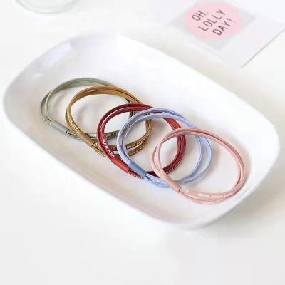 China Pretty Word Printing Customized Elastic Hair Band Hair Tail Hair Band for sale