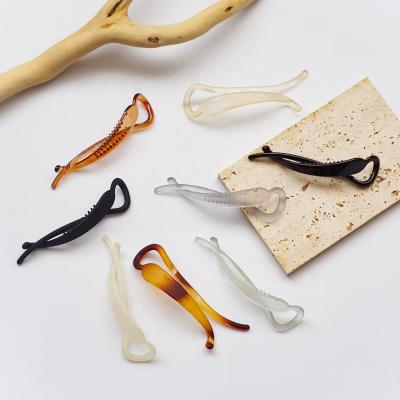 China Newest European and American style designers hair claw multi color banana hair clip for women for sale