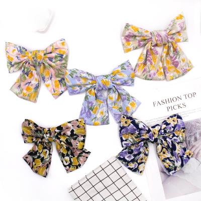 China Color Hair Pin Newest Classical Floral Oversized Hair Clip Bow Spring Clip For Women for sale