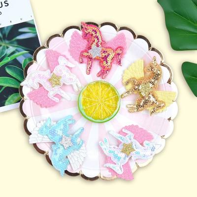 China Newest Pure Star Wing Hairpin Unicorn Children Hair Clips European and American Style Color Glitter for sale