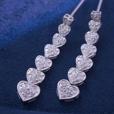 China CLASSIC hot sale fashion jewelry18k solid gold baguettes diamonds heart shape stud earrings for women for sale