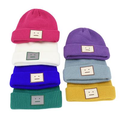 China Factory Wholesale Custom Leather Patch Winter Hats Double Layers Warm Fisherman Woolen Beanie Hats for sale