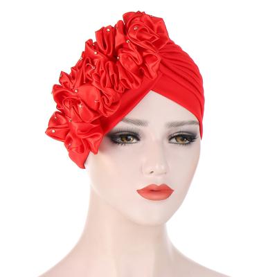 China DecorateÂ   2021 Latest Women Pearl Hijab Headwrap Fashion Cheap Flower Muslim Turban Hood Hats for sale