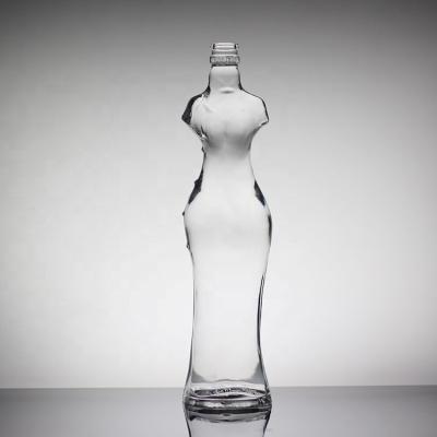 China Botella de vidrio femenina de belleza en forma personalizada para aficionados y conocedores del vino en venta