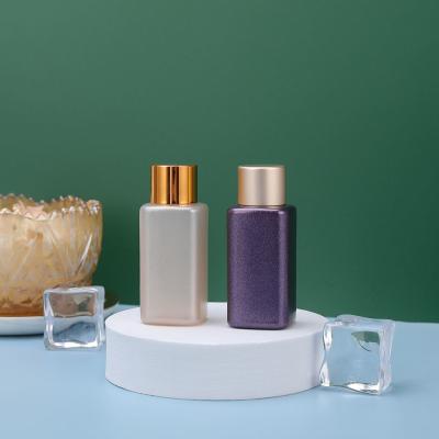 China 20ml Luxury Purple Sample Plastic Packaging Bottle Plastic Cosmetic PET Bottle for sale