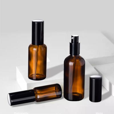 Cina 30ml Brown Glass Lotion Sub Bottle Essence Liquid Oil Pressing With Anodized Aluminum Head in vendita