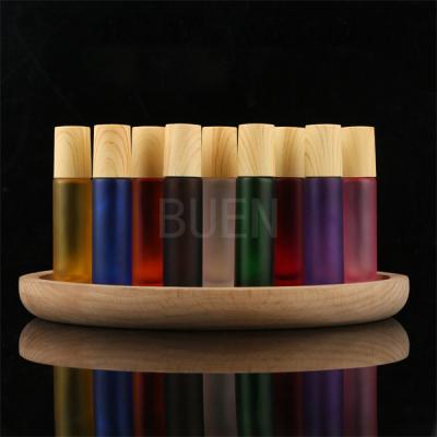 China 10ml Leak Proof Glass Roll On Bottle Skin Care With Bamboo Cap for sale