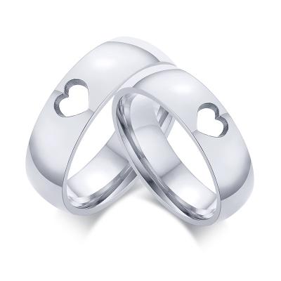 China Fashion Jewelry TRENDY Simple Stainless Steel Silver Hollow Heart Couple Wedding Rings for sale