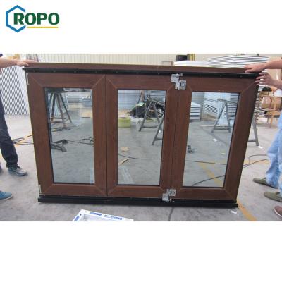 China AS2047 Australia Magnetic Standard Wood Color Double UPVC Folding Glass Window for sale