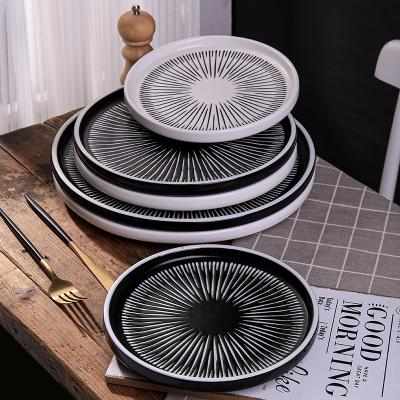 China CANHUI Creative Sustainable Western Food Dish Black Porcelain Dinner Plate Restaurant White Serving Hotel Plates Ceramic Dinnerware Set for sale