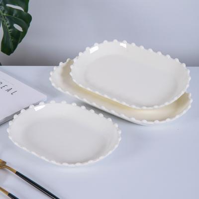 China Viable Creative Custom Made Ceramic White Nordic Porcelain Dinner Oval Dish Design Dish for sale