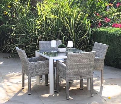 China Contemporary Outdoor Rattan Furniture Sets Pe 4seaters Rattan Cube Dining Table Set Rattan Patio Table Set for sale