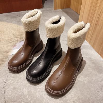 China Fashion new products fashion trend platform women's round waterproof anti-skid warm combat boots cashmere slip-on boots for sale