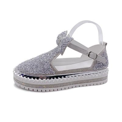 China Round Diamond Rhinestone Lady Loafers Women's Workout Shoes Women Plus-size Bowknot Decoration Hole Sandals Factory for sale