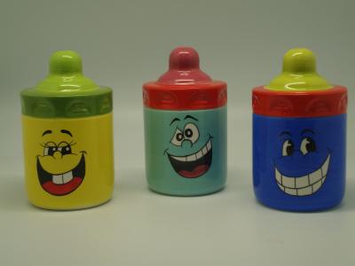 China Smiling Face Porcelain Childrens Piggy Bank Feeding Bottle Shaped 10 X 10  X 16 Cm for sale