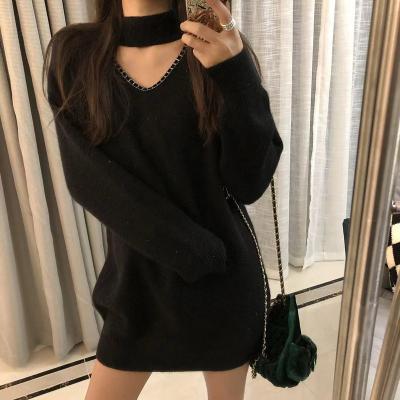 China custom Anti-wrinkle turtle neck hollow out women's solid color knitted sweater pullover mid length hollow-out design sexy v neck sweater for sale