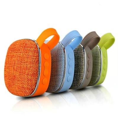 China Custom Logo X.25 Function Phone Fabric Portable Radio Outdoor Speaker With Silicone Grip Fabric Mesh Bt Speaker for sale