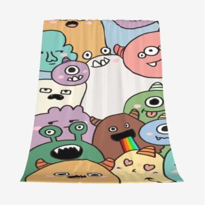 China Jacquard Flannel Plush Throw Blanket Fabric Colorful Little Monster Baby Blanket All Seasons Kids Blanket for sale