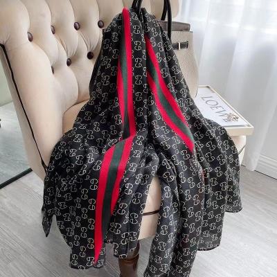 China New and autumn temperament soft touch feeling scarf women's fashion spring protection gauze beach towel wild wild toe scarf for sale